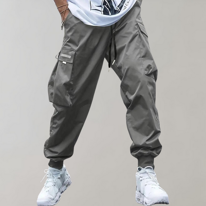 Sommerfeld™ | Herren Cargo Jogginghose – Lila Streetwear-Hose mit Reißverschlusstaschen & Bündchen