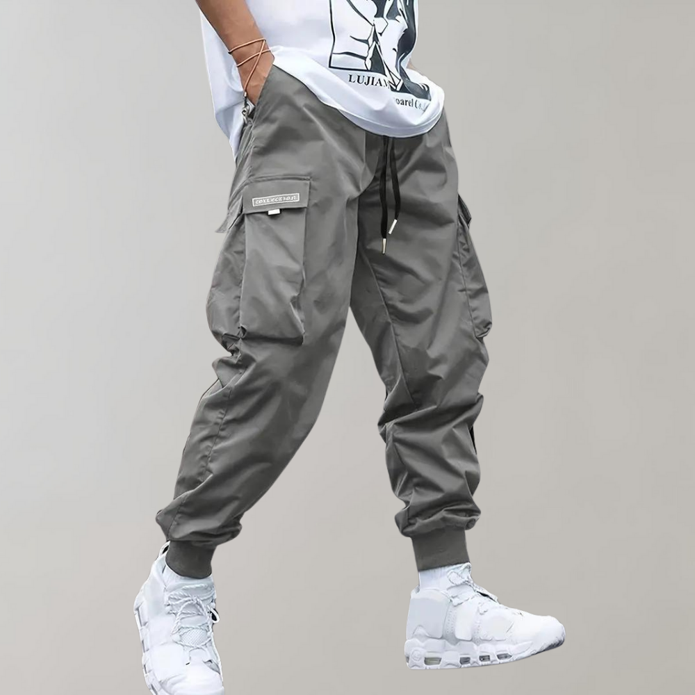 Sommerfeld™ | Herren Cargo Jogginghose – Lila Streetwear-Hose mit Reißverschlusstaschen & Bündchen