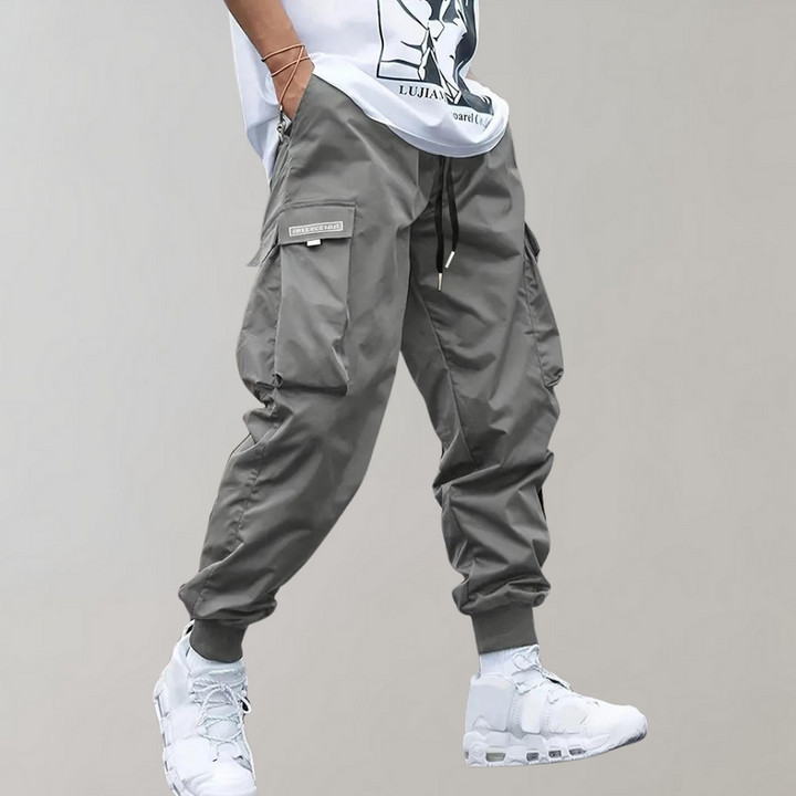 Sommerfeld™ | Herren Cargo Jogginghose – Lila Streetwear-Hose mit Reißverschlusstaschen & Bündchen